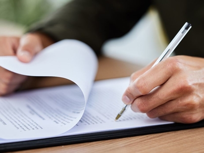 lawyer writing contract