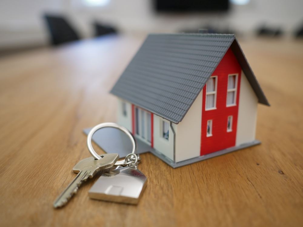 Model home and a set of keys.